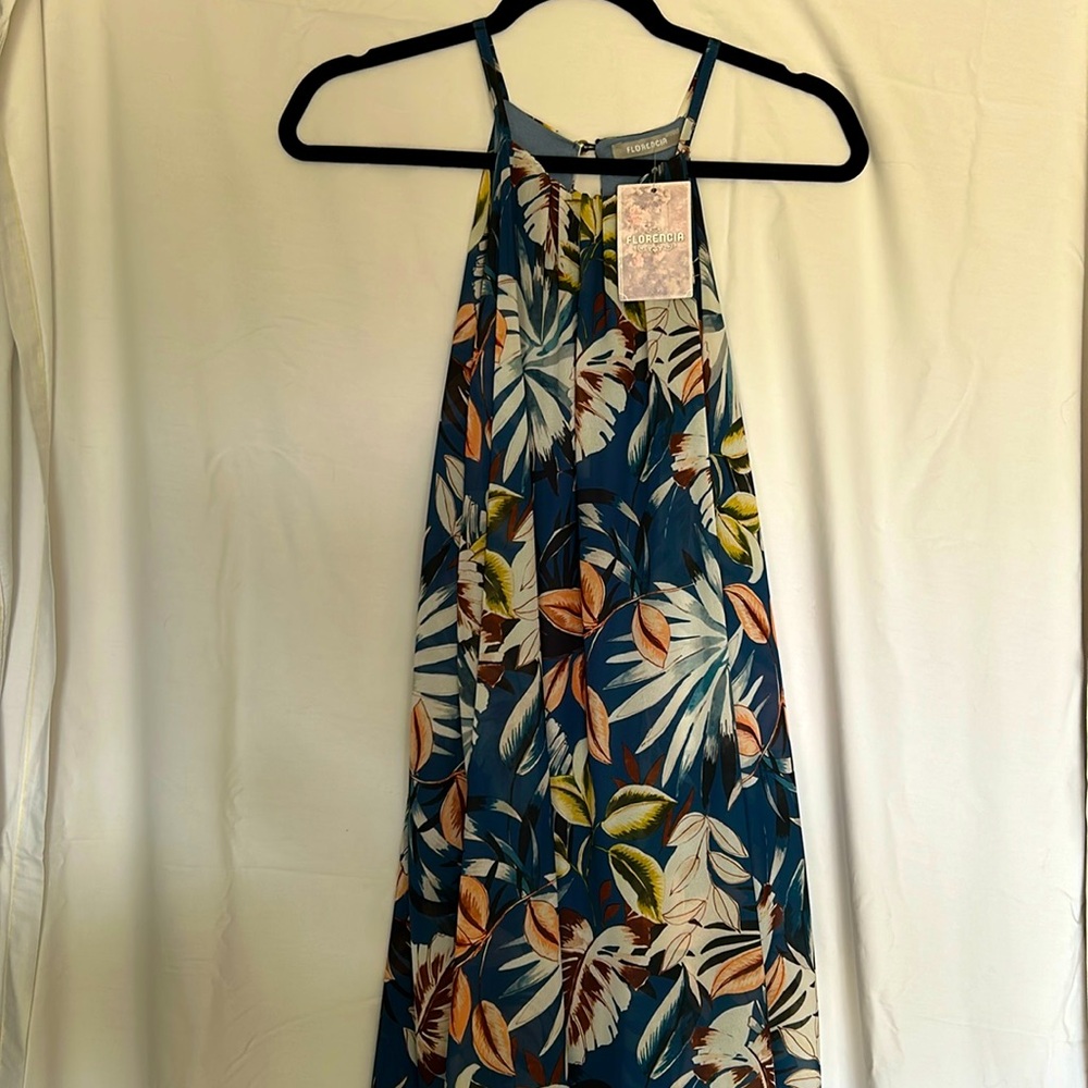 NWT…. Ladies sheer dress … picked up in Barcelona have never worn.